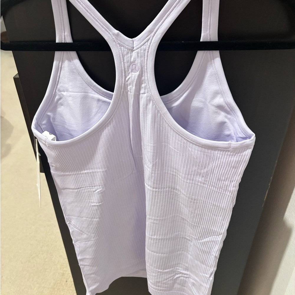 Lululemon Ebb to Street to Tank in Lavender Frost
Size 10 - Picture 4 of 6